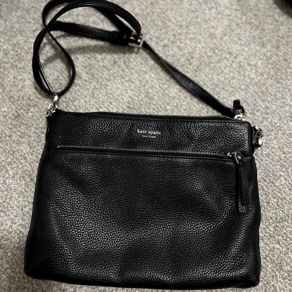 Kate Spade crossbody leather bag with pink interior